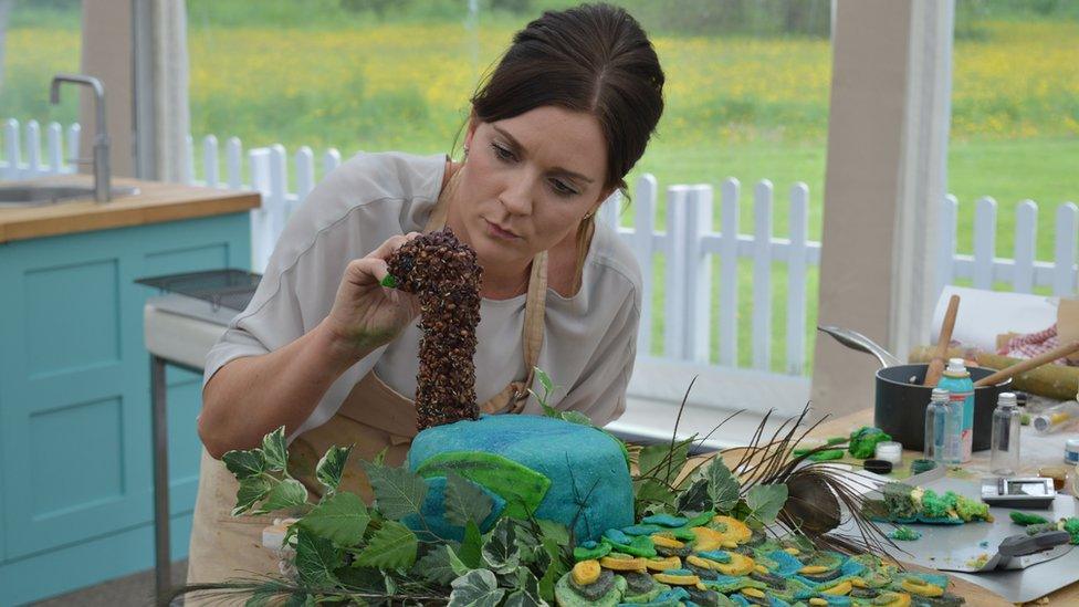 Showstopper. Candice painting detail onto her Peacock.