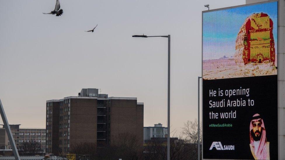 Billboards show adverts for the Saudi crown prince with the hashtag "#ANewSaudiArabia" next to the A4 in London