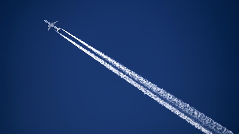 Aeroplane emitting a contrail