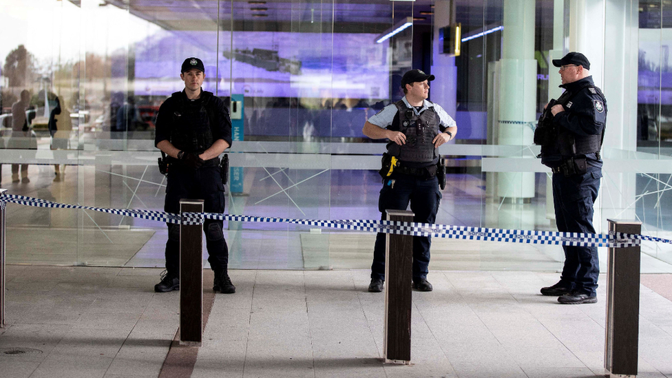 Armed police at Canberra airport. Photo: 14 August 2022