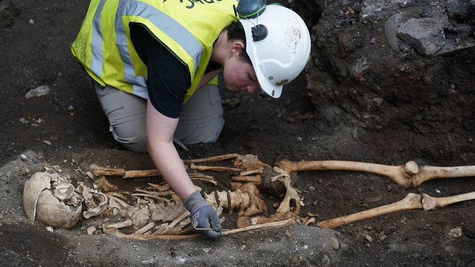 Archaeologist and skeleton, Capel St, Dublin