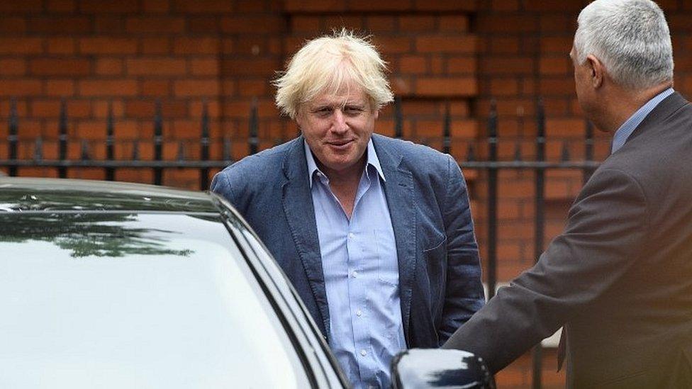 Boris Johnson leaving the Foreign Office