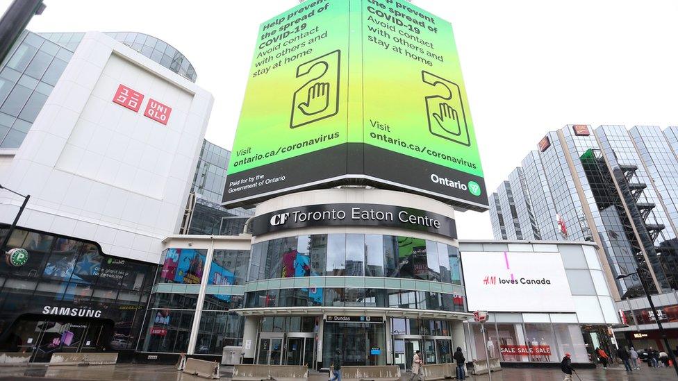 Toronto's Eaton Centre has concrete barriers in place at ground level entrances as only essential industries are open