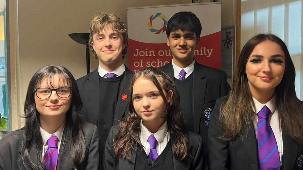 School children who will be using the prom shop