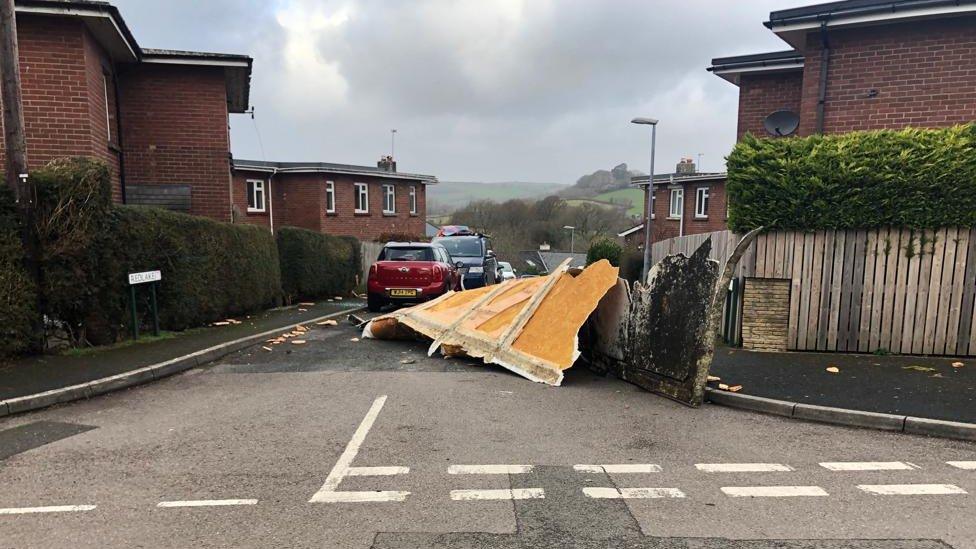 Roof debris on road