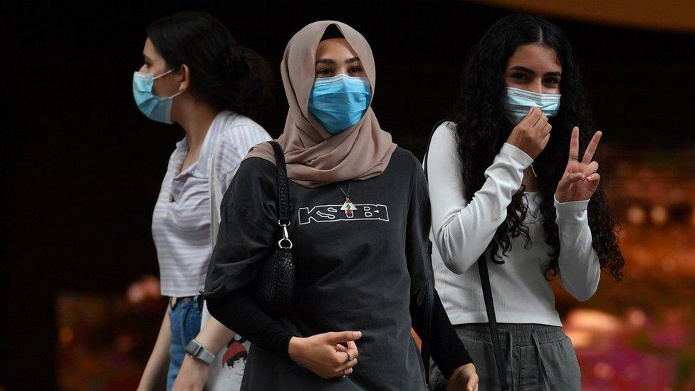 Shoppers wearing masks in Sydney on Monday December 21