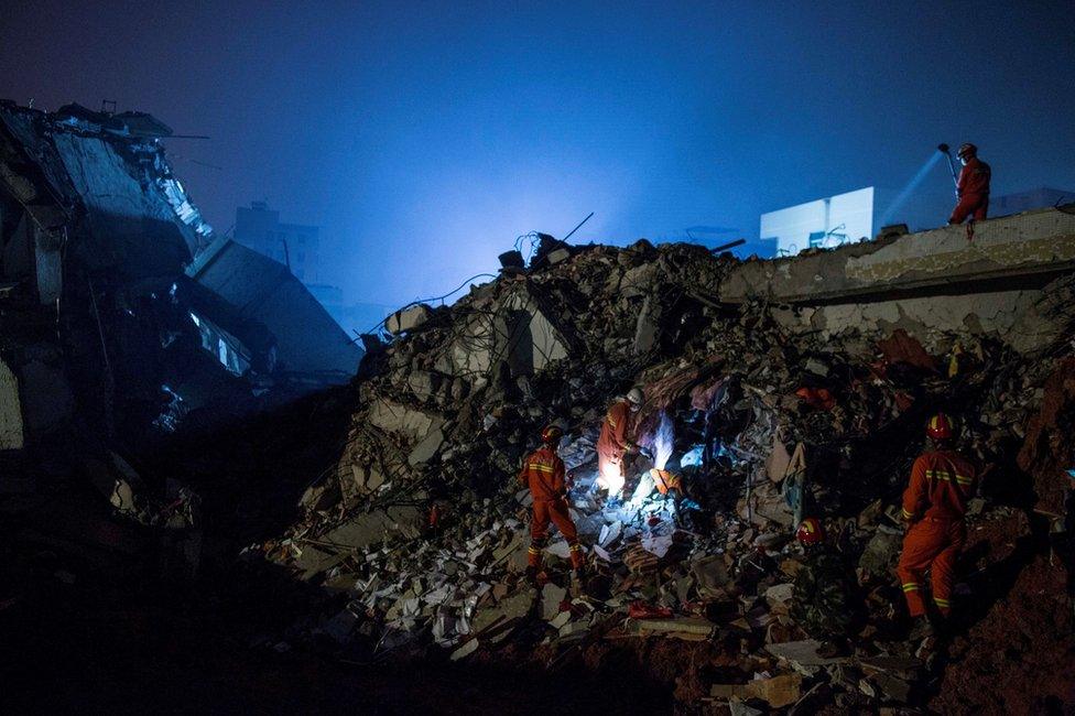 Emergency services search rubble for survivors after a landslide buried 22 buildings on 20 December 2015 in Shenzhen, China