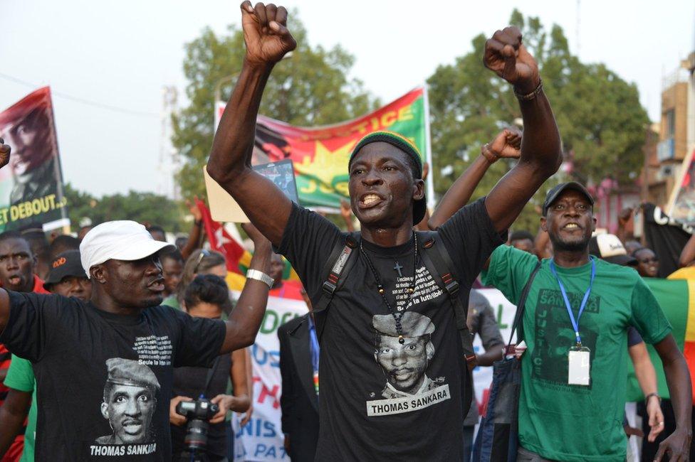 A man raises his arms as he attends a protest in tribute to Thomas Sankara in Ouagadougou, Burkina Faso - Sunday 2 October 2016