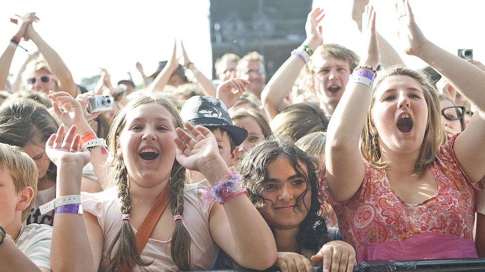 Children watching in the audience during the first day of Cornbury in 2010