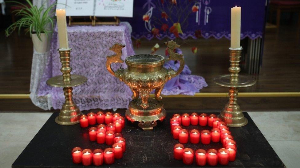 Candles in the shape of the number 39, at the memorial service for the victims.