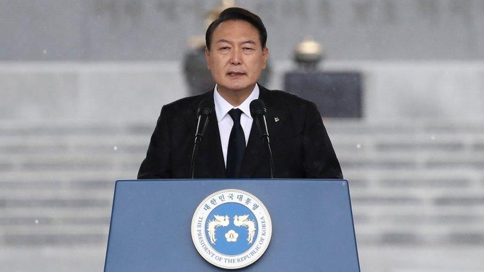 South Korean President Yoon Suk-yeol speaking at a ceremony during Korean Memorial Day