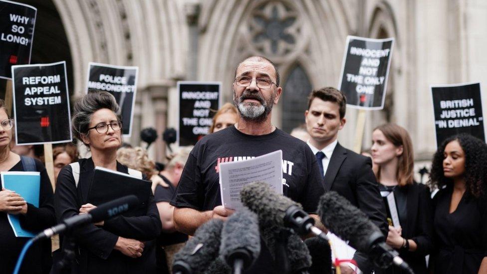 Andrew Malkinson, who served 17 years in prison for a rape he did not commit, reads a statement outside the Royal Courts of Justice in London, after being cleared by the Court of Appeal.