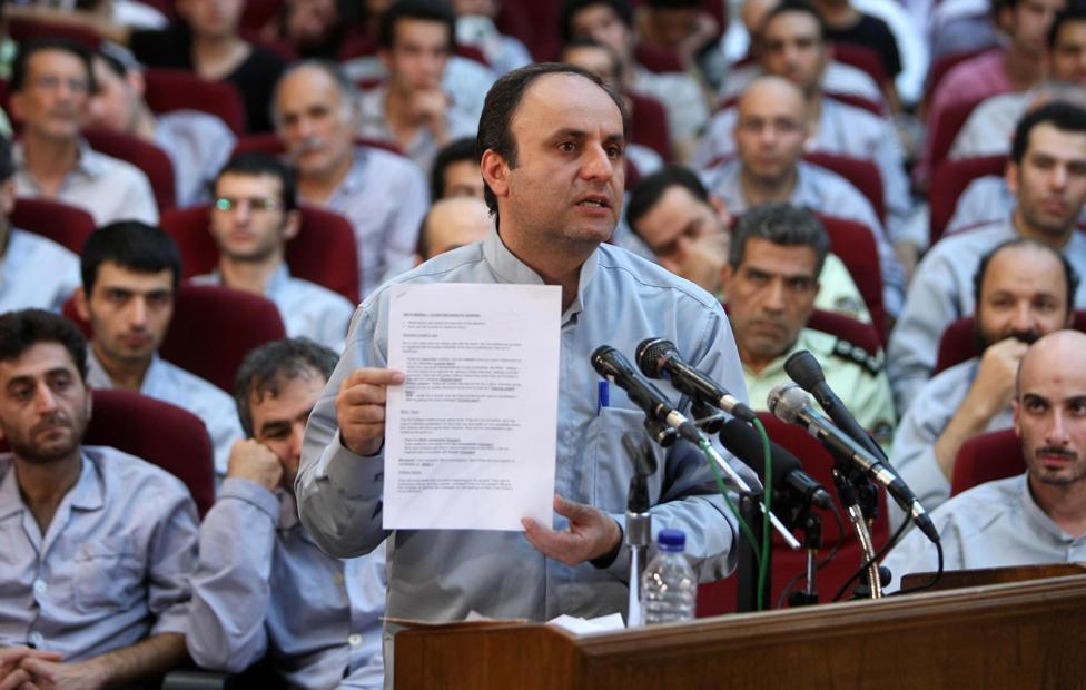 Hossein Rassam defends himself during a hearing at a revolutionary court in Tehran on August 8, 2009