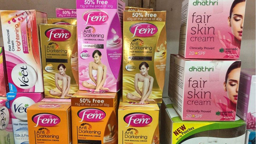 Skin lightening (skin whitening) creams for sale at a shop in India