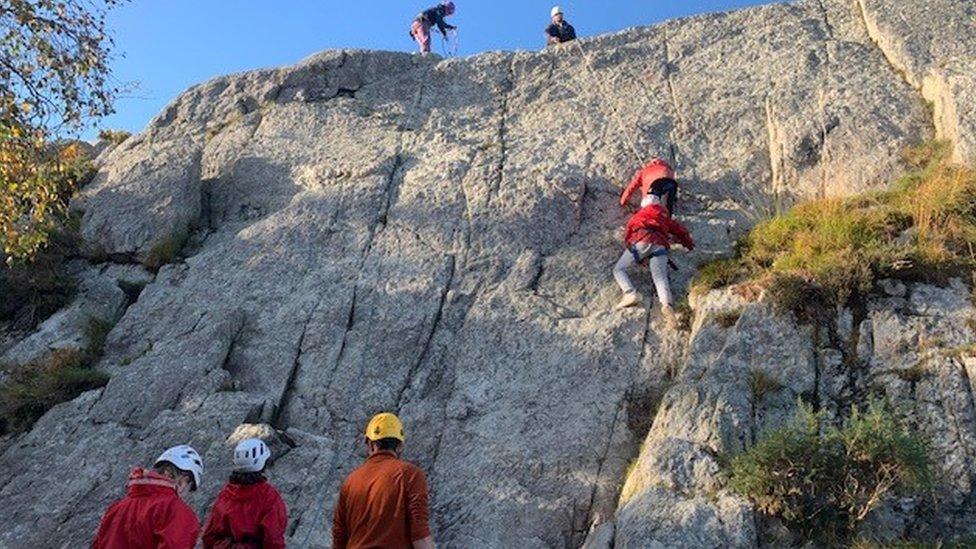 Children rock climbing