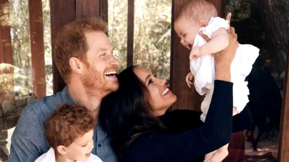 Image from 2021 holiday card from Duke and Duchess of Sussex showing the couple with their children Archie and Lilibet