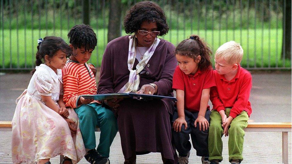 Betty Campbell with five-year-olds Ayat Mohammed, Videl Farrah, Ellis Parsons and Keiron Perry