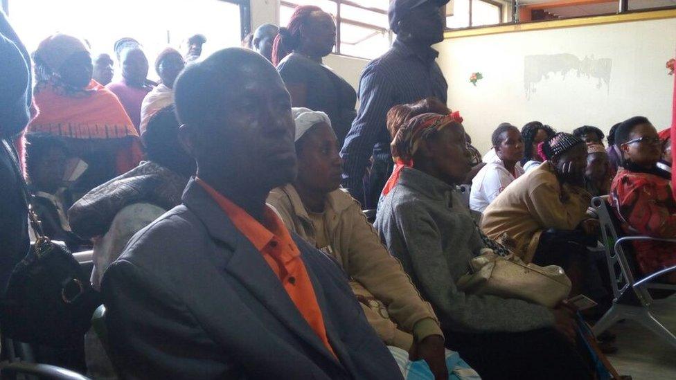 Patients sitting in a waiting room