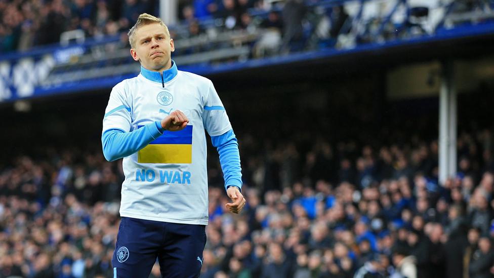 Oleksandr Zinchenko wears a t-shirt reading 'No War' at Goodison Park on 26 February 2022 in Liverpool, United Kingdom