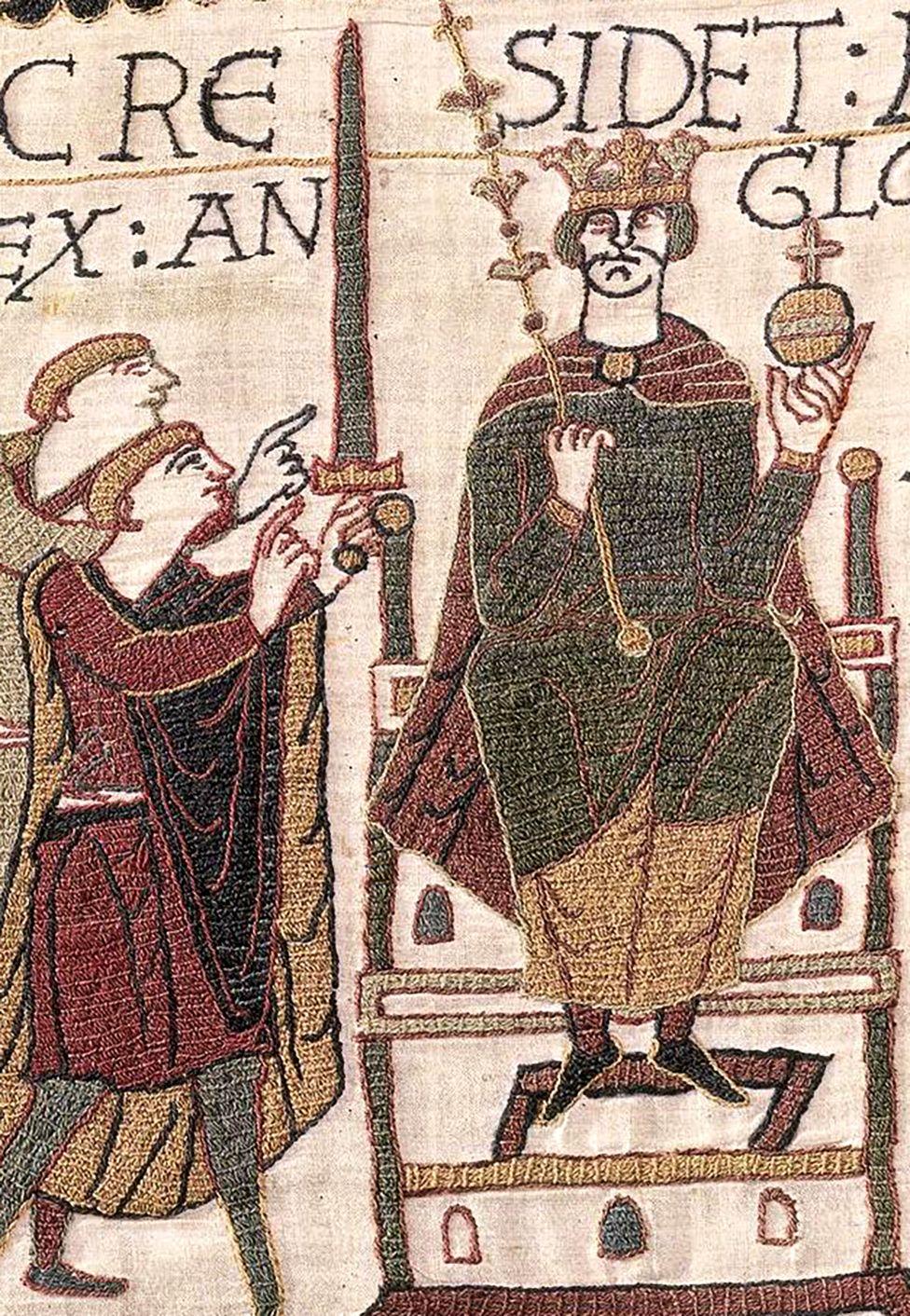 A close crop of the same scene, centred on Harold sitting on the throne holding an orb and stick along with figures to his left, with medieval lettering and fabric texture detail.