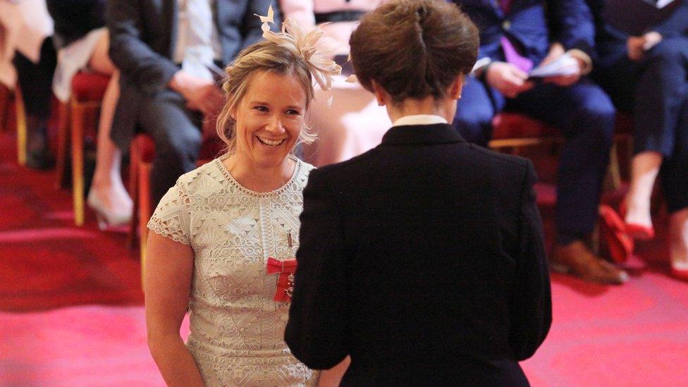 Sailor Hannah Mills being awarded her MBE