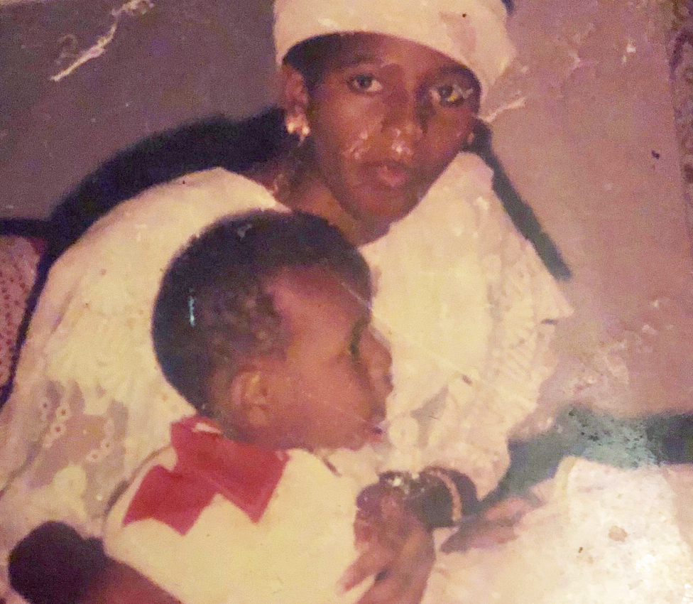 Samuel Abdulraheem and his mother when he was a toddler