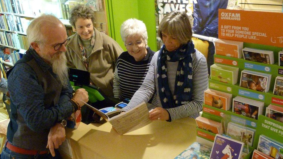 Tony and volunteers with Bonham's catalogue