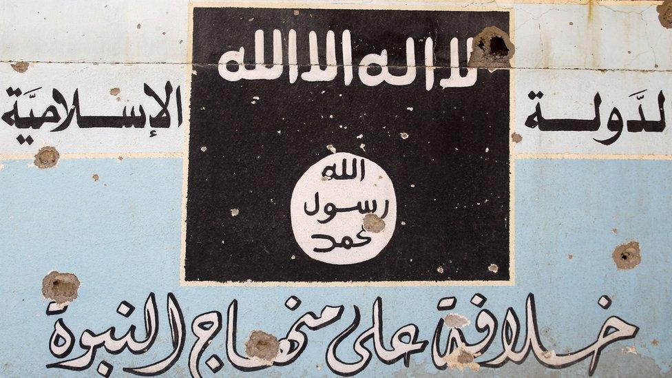 A sign belonging to IS near Hawija.