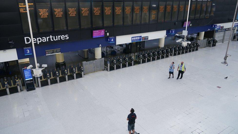 Commuters during the evening rush hour at Waterloo Station in London on Thursday