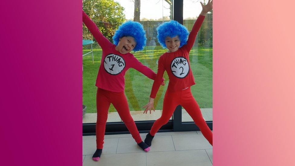 Jessica and Megan are looking mischievous as Thing 1 and Thing 2