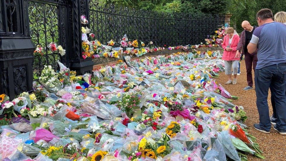 Floral tributes outside gates of Sandringham House, Norfolk