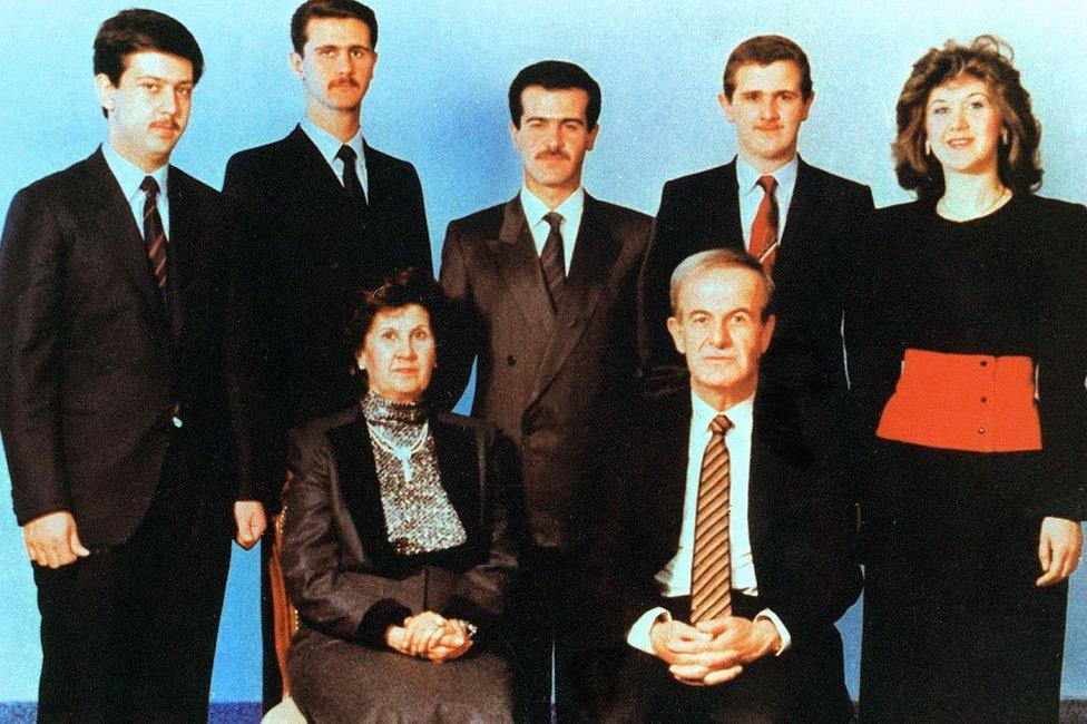 Syrian President Hafez al-Assad and his wife Anisa Makhlouf posing for a family picture with his children (L to R) Maher, Bashar, Bassel, who died in a car accident in 1994, Majd and Bushra.