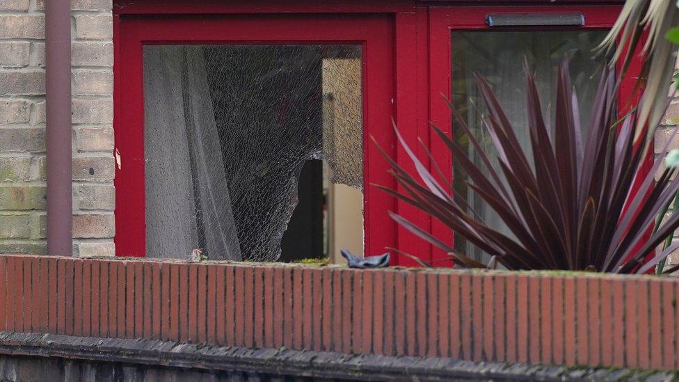 A shot of a window smashed of a property in Bywater Place