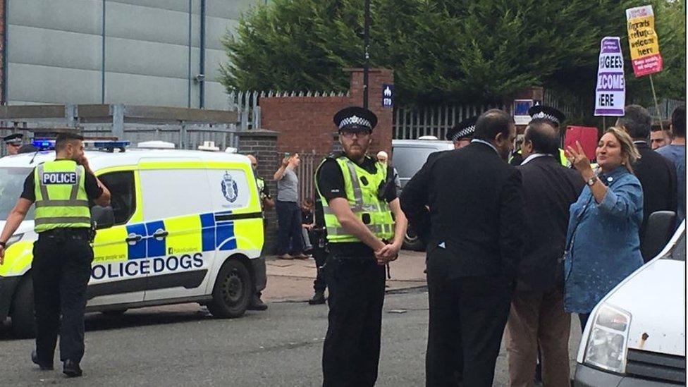 Protesters at the Home office in Govan