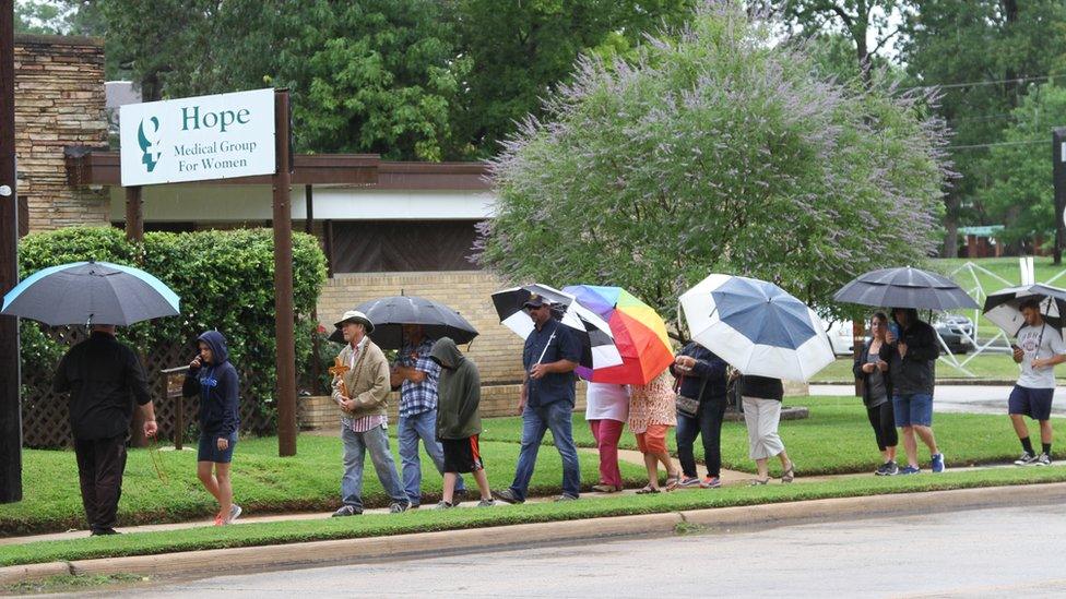 Demonstrators outside the clinic