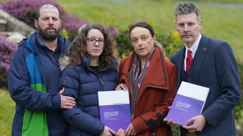 Colin and Kayleigh Griffiths, Rhiannon Davies and Richard Stanton with a copy of the Donna Ockenden Independent Review into Maternity Services