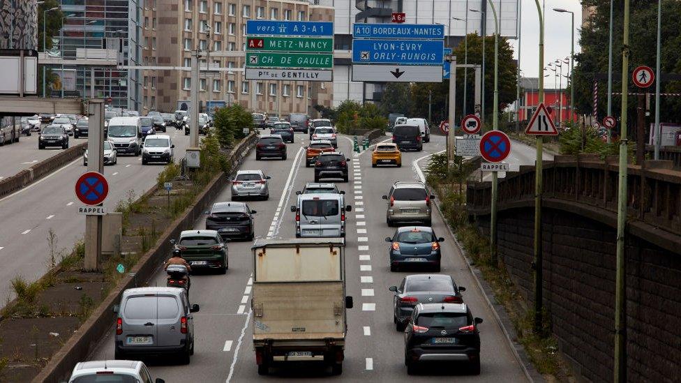 A traffic jam on a road in Paris