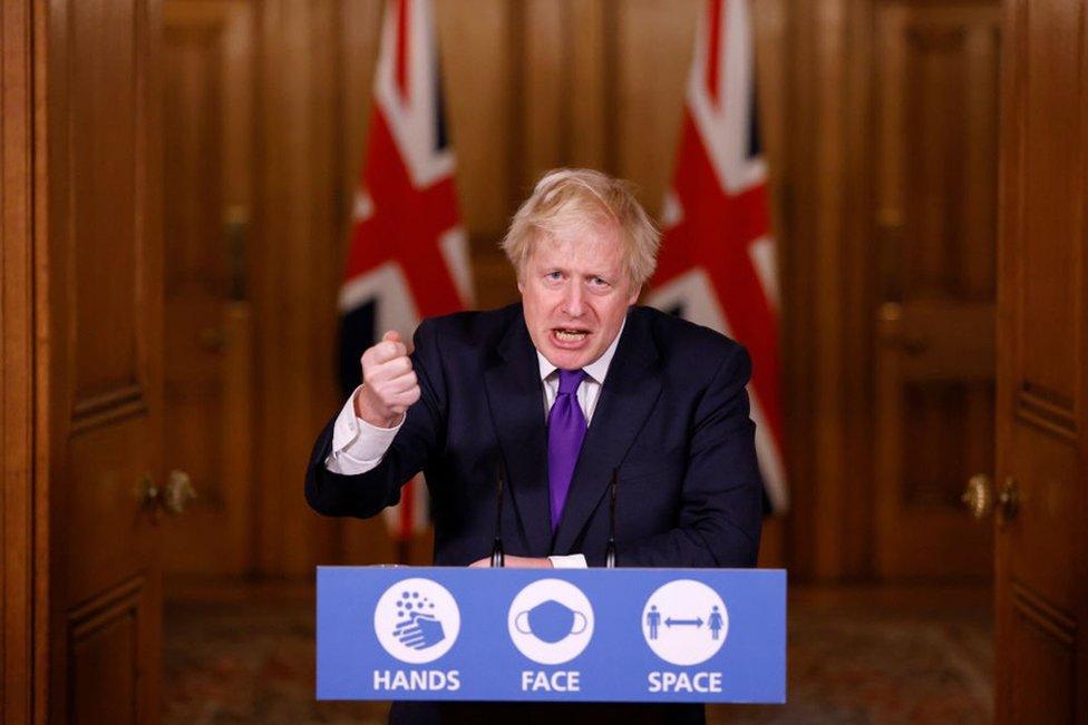 Prime Minister Boris Johnson speaks during a news conference on the ongoing situation with the coronavirus disease (COVID-19), at Downing Street on 2 December 2020 in London, England.