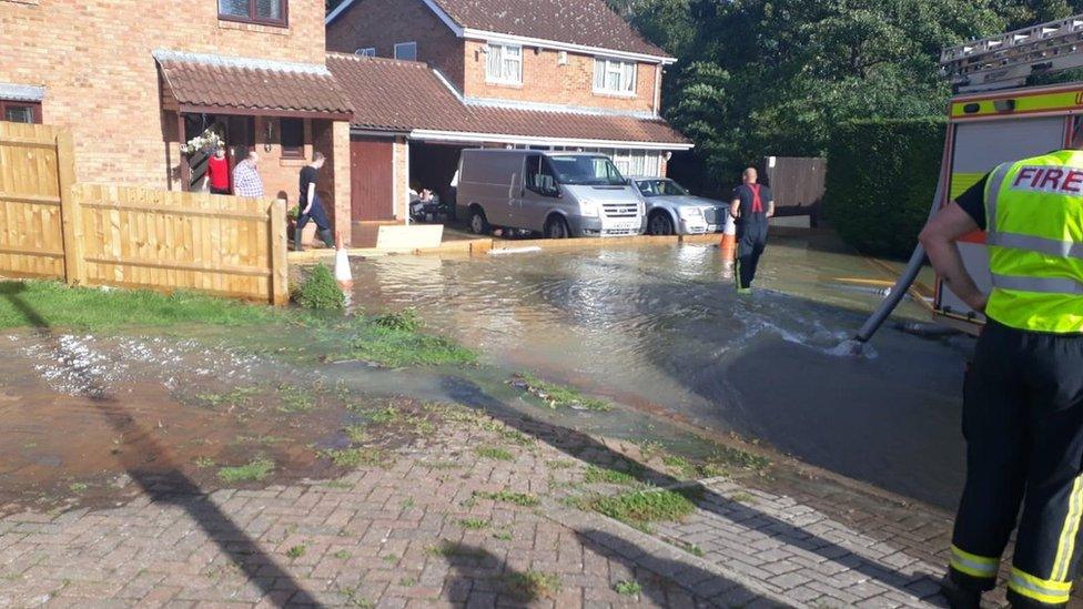 The fire brigade tackling the flooding in Neath Hill, Milton Keynes