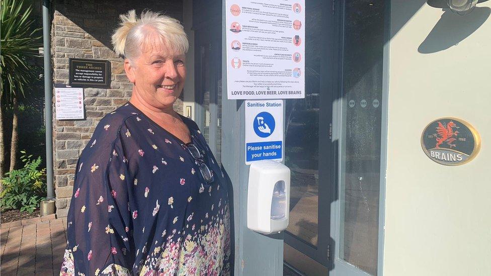 Landlady Jayne Edwards outside the three arches pub