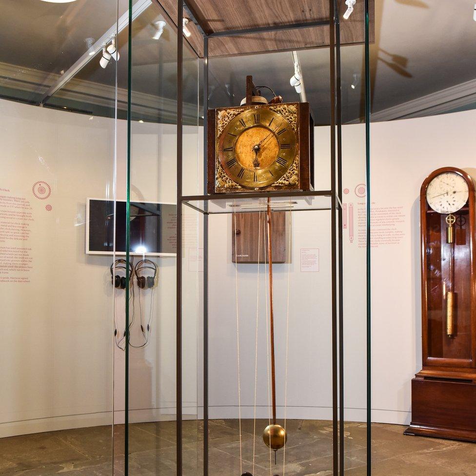 Early wooden longcase clock created in 1717