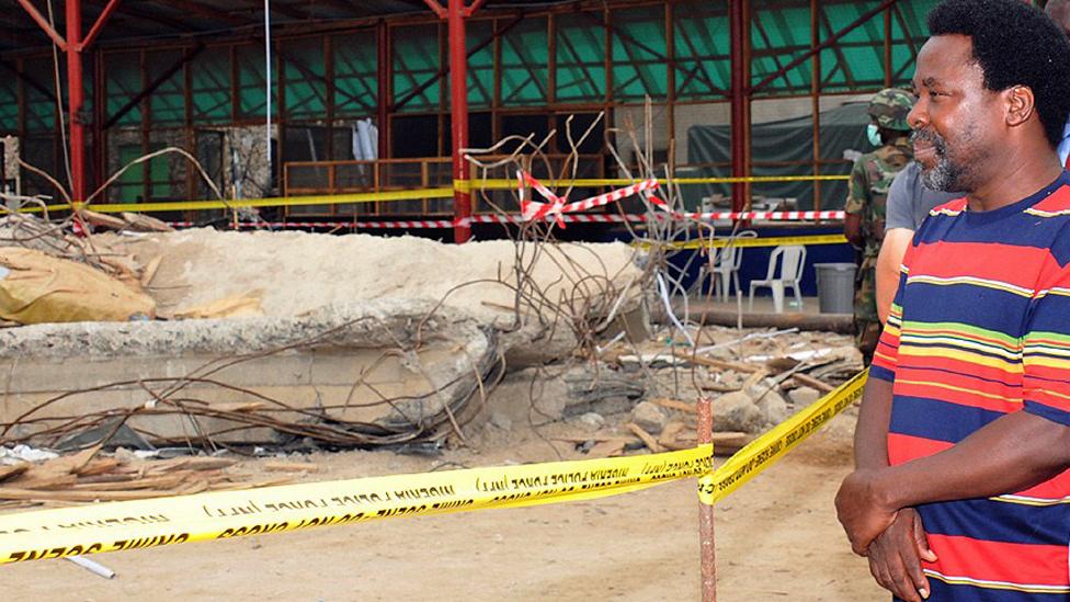 TB Joshua looks at the rubble of the collapsed church guesthouse of the Synagogue Church of All Nations in Lagos, Nigeria - 20 September 2014