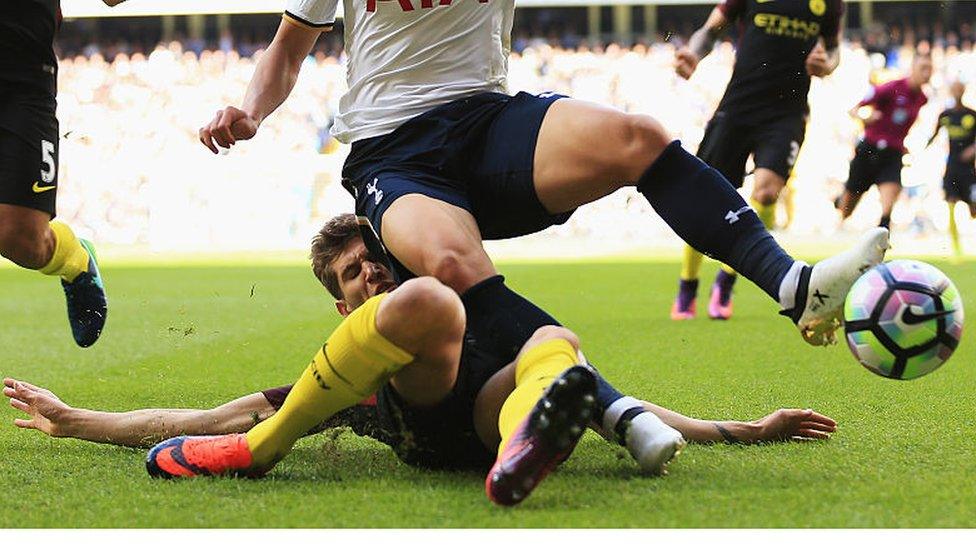 John Stones launches a crunching tackle