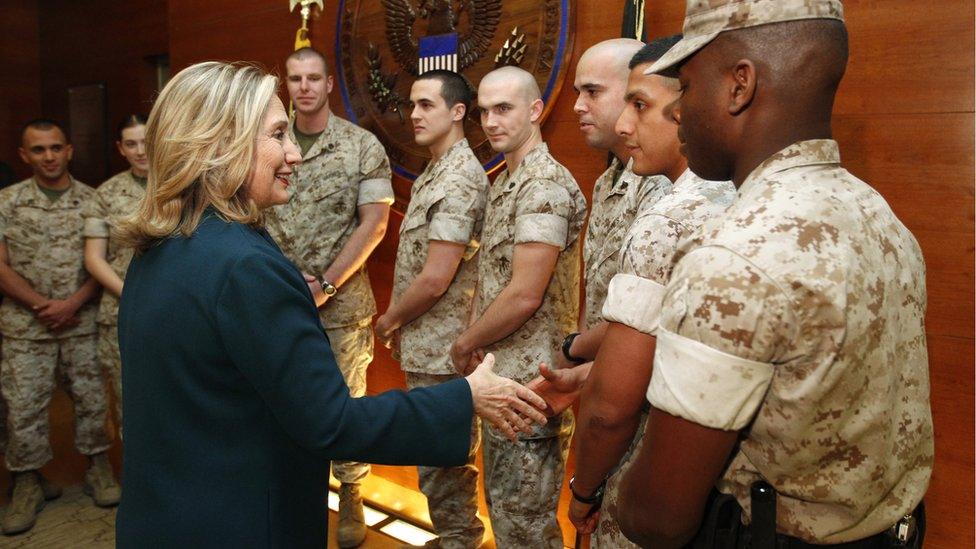 Hilary Clinton shakes hands with US troops on a visit to Afghanistan in 2011.