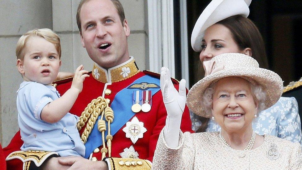 George, Prince William, Kate, the Queen and Prince Harry watch from the balcony