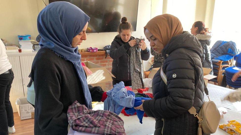 People in Wiltshire donating clothes