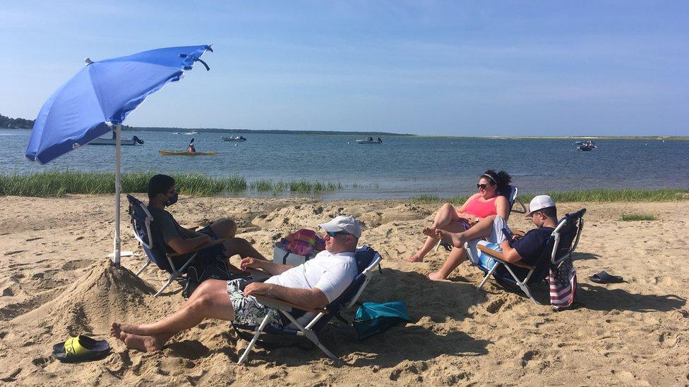 Zoe Fishman and family sunbathe on Cape Cod