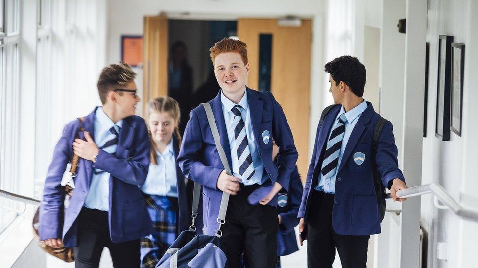 Teenagers in school uniform