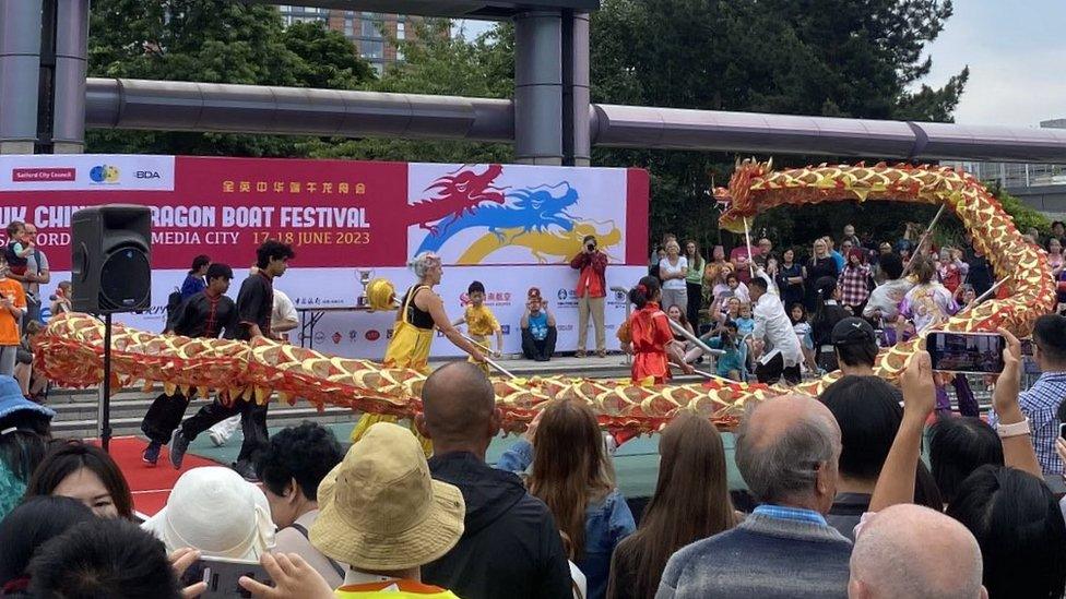 people watch dragon parade