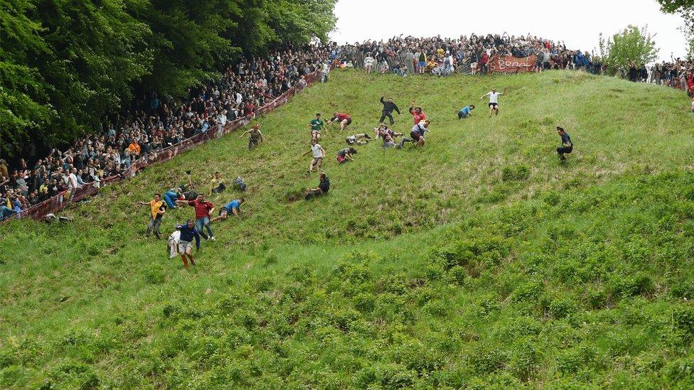 Cheese rolling on Cooper's Hill at Brockworth, Gloucestershire